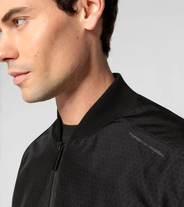 PORSCHE DESIGN Masterpiece blouson Bunda volnočasová sportovní na zip a šestiúhelníkovým vzorem černá