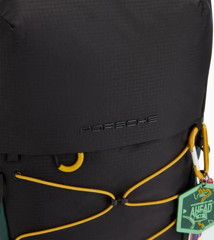 PORSCHE Backpack AHEAD M Batoh volnočasový na cesty černý se zelenými a žlutými prvky s přihrádkou na notebook